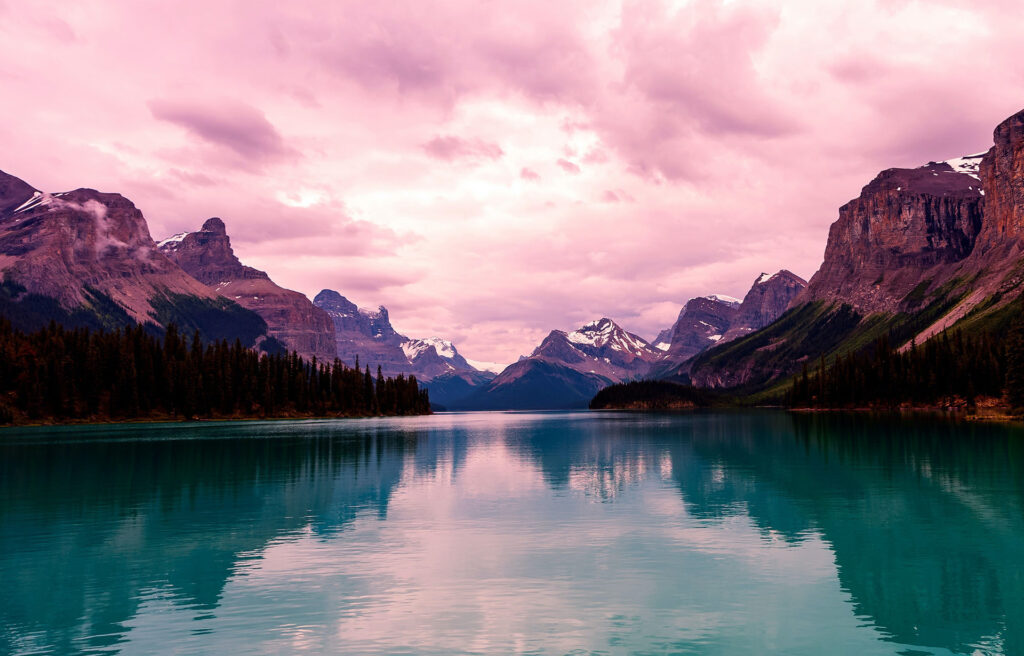 Pink Sky and Mountains reflected in Water - Header Image for the Reflecting on 2022 Blog Post